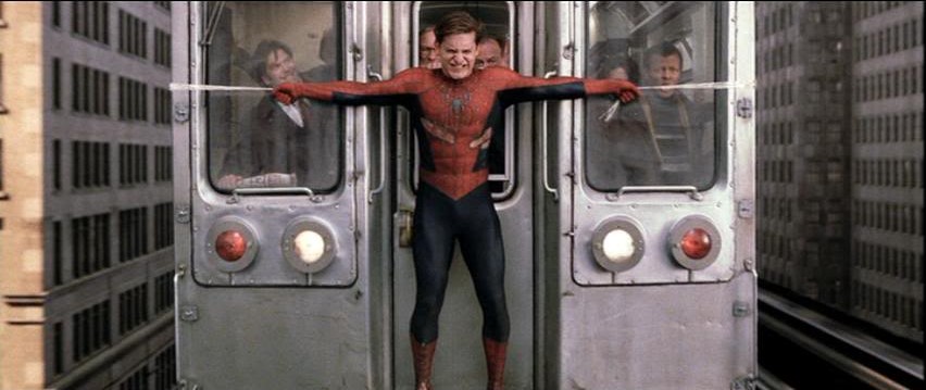 Cena do filme Homem-Aranha (2002) em que ele freia um trem usando suas teias.